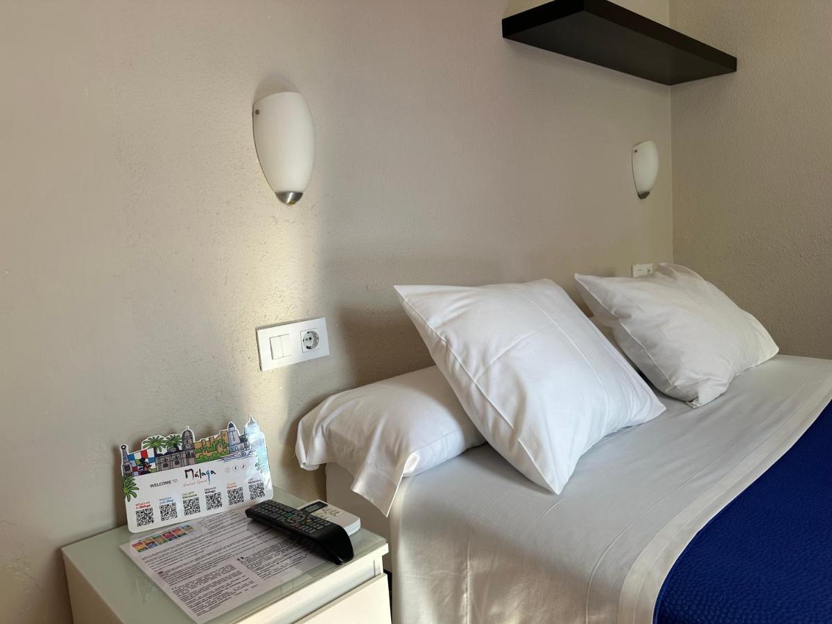 Hostal Moscatel Малага Экстерьер фото